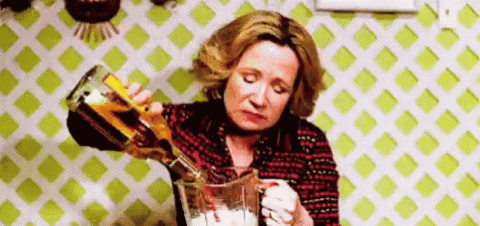 Kitty Forman from That '70s Show pouring herself a huge drink