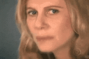 Blonde woman thinking hard while math equations float around her, the math lady meme