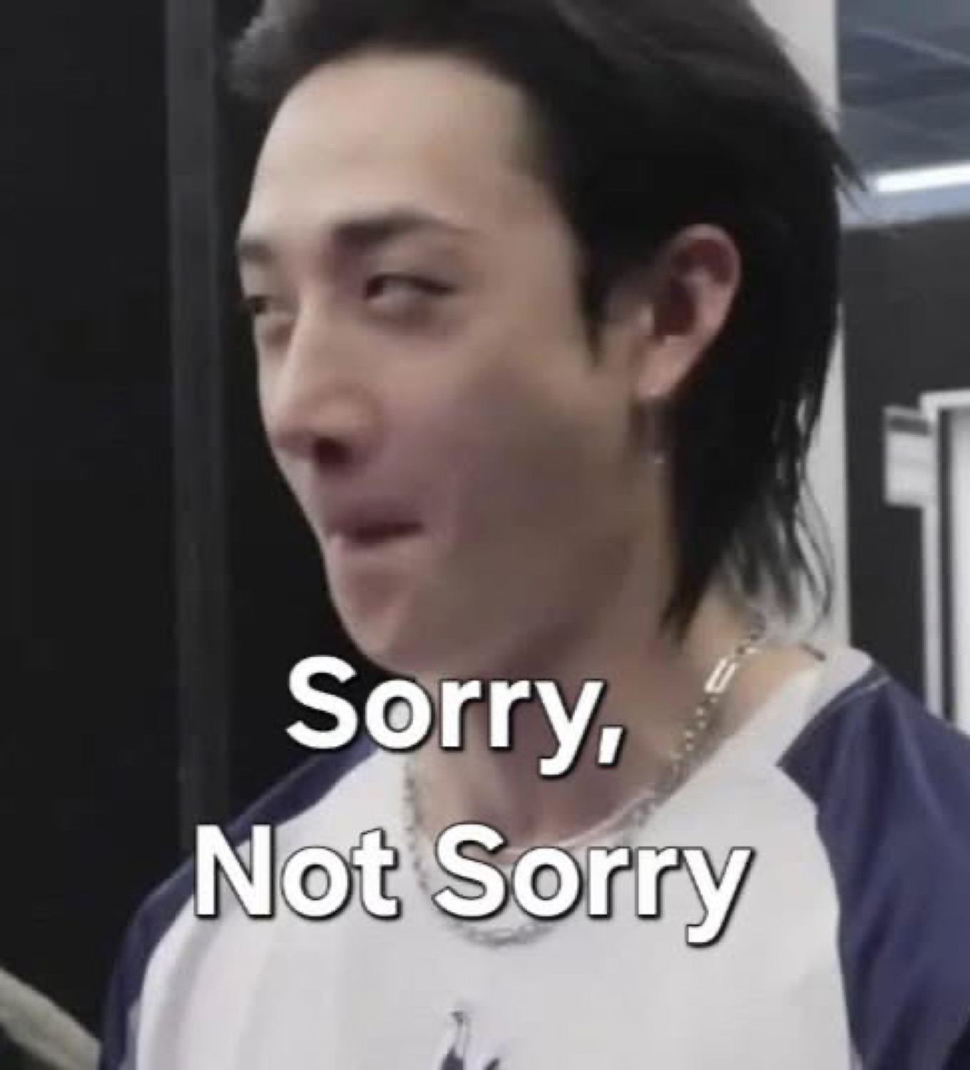 Mullet guy smirking off to the side, captioned "Sorry, Not Sorry"