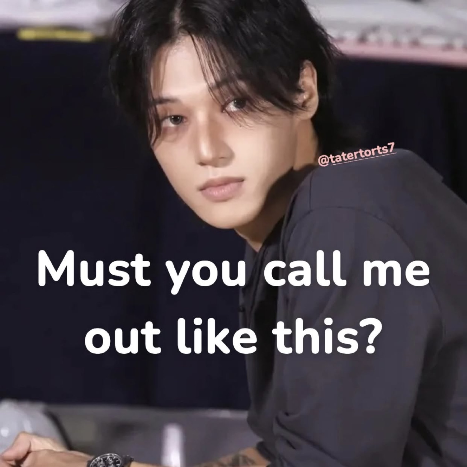 Long-haired man glancing over his shoulder, captioned 'Must you call me out like this?'