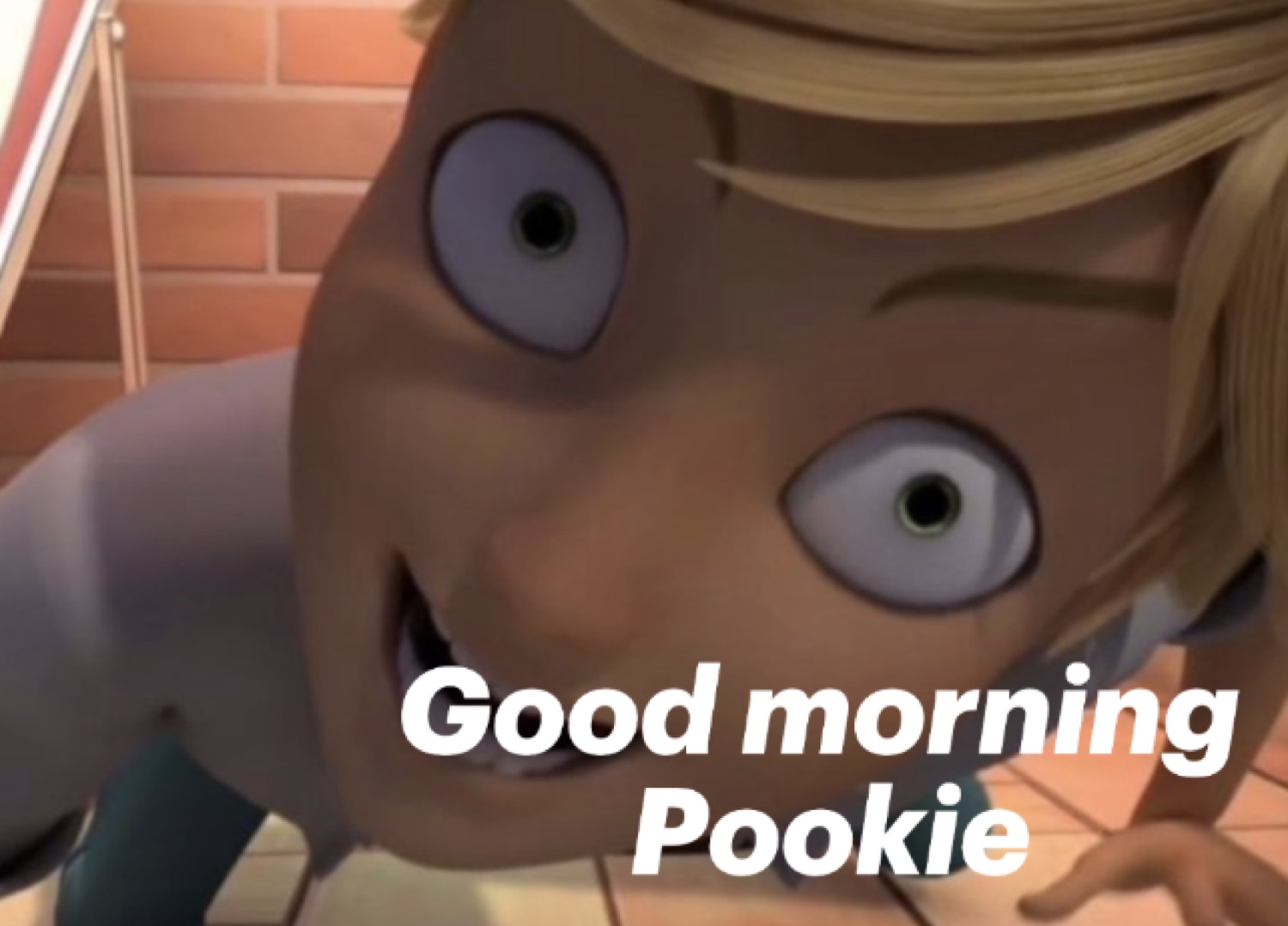 Cursed close-up of Adrien from Miraculous grinning: 'Good morning Pookie'