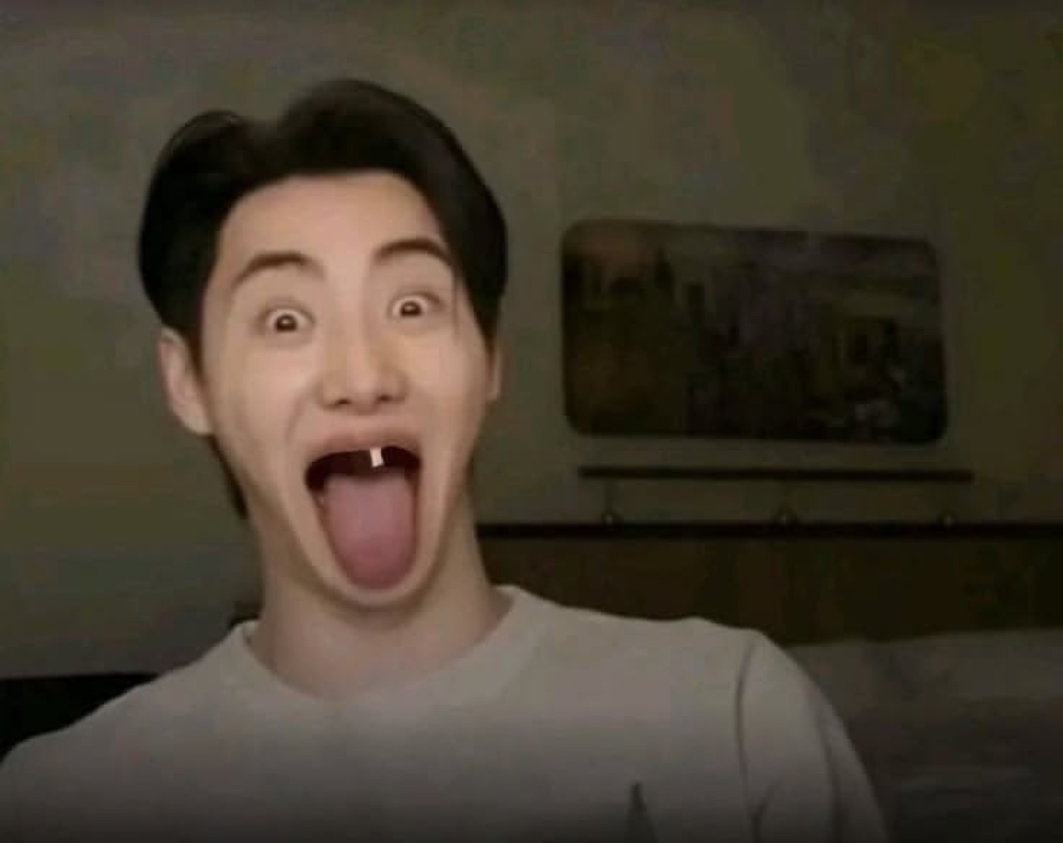 Man with mouth wide open and tongue out reacting with extreme shock or excitement