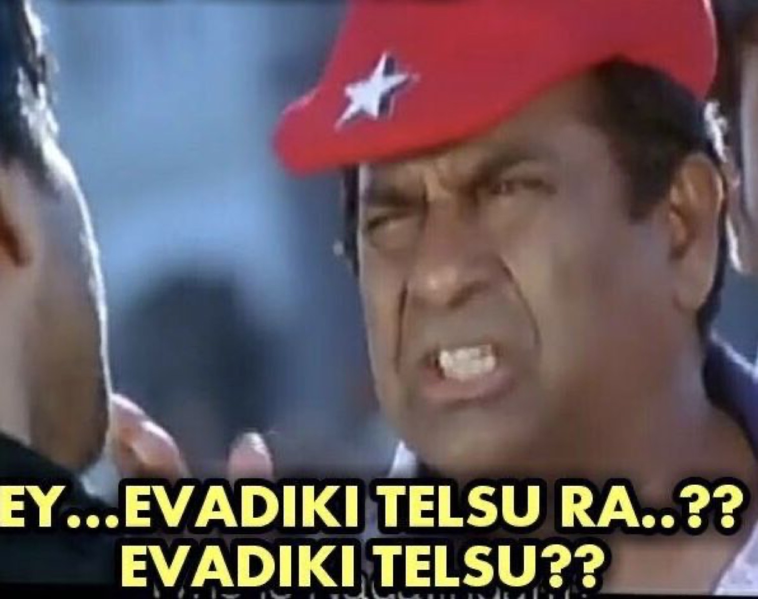 Brahmanandam in a red cap shouting: 'EY...EVADIKI TELSU RA..?? EVADIKI TELSU??' (who knows?!)