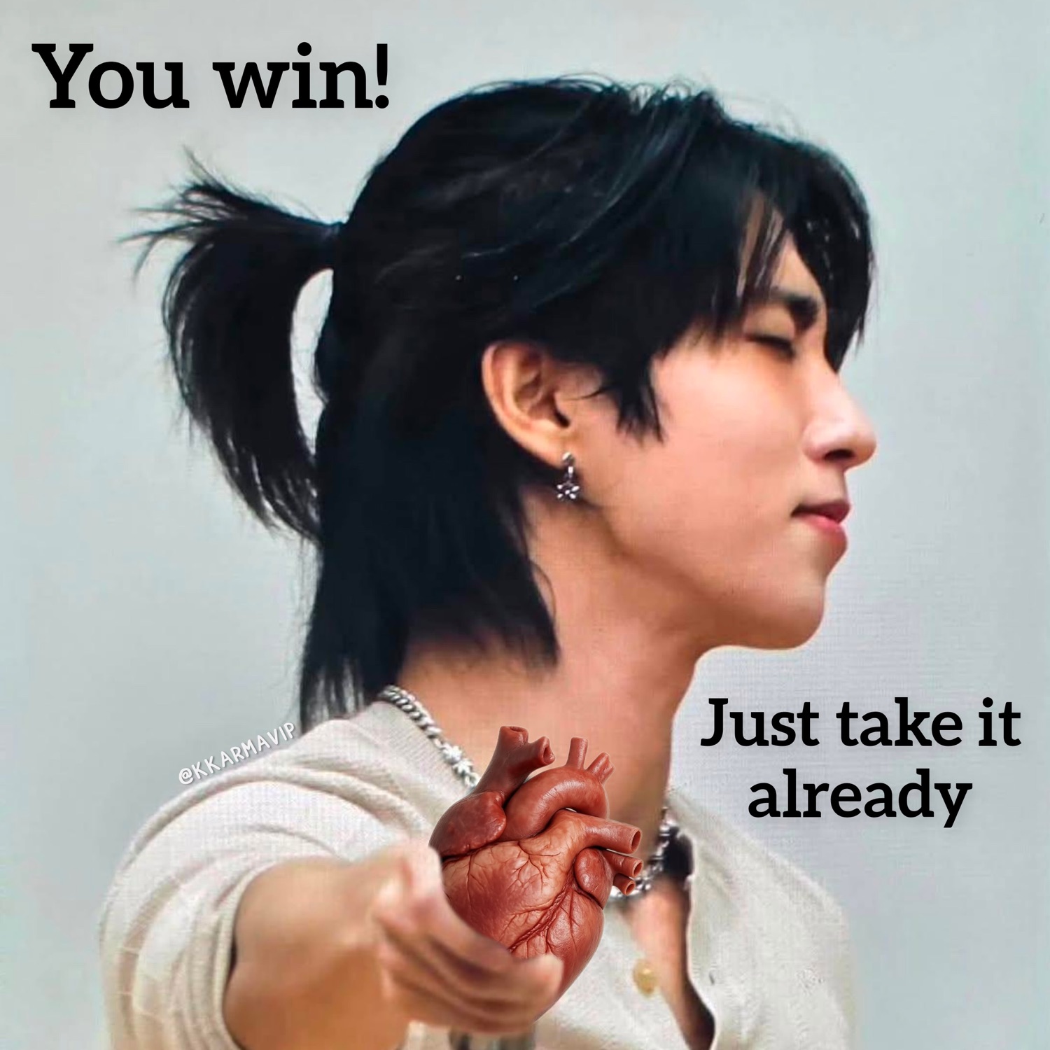 Man holding out a real heart in profile, captioned 'You win! Just take it already'