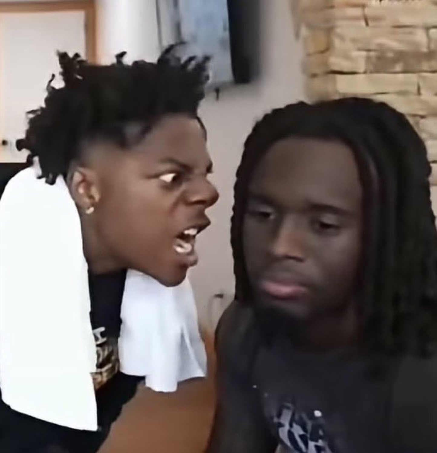 Two guys where one is yelling right in the other's face while he stays completely unbothered