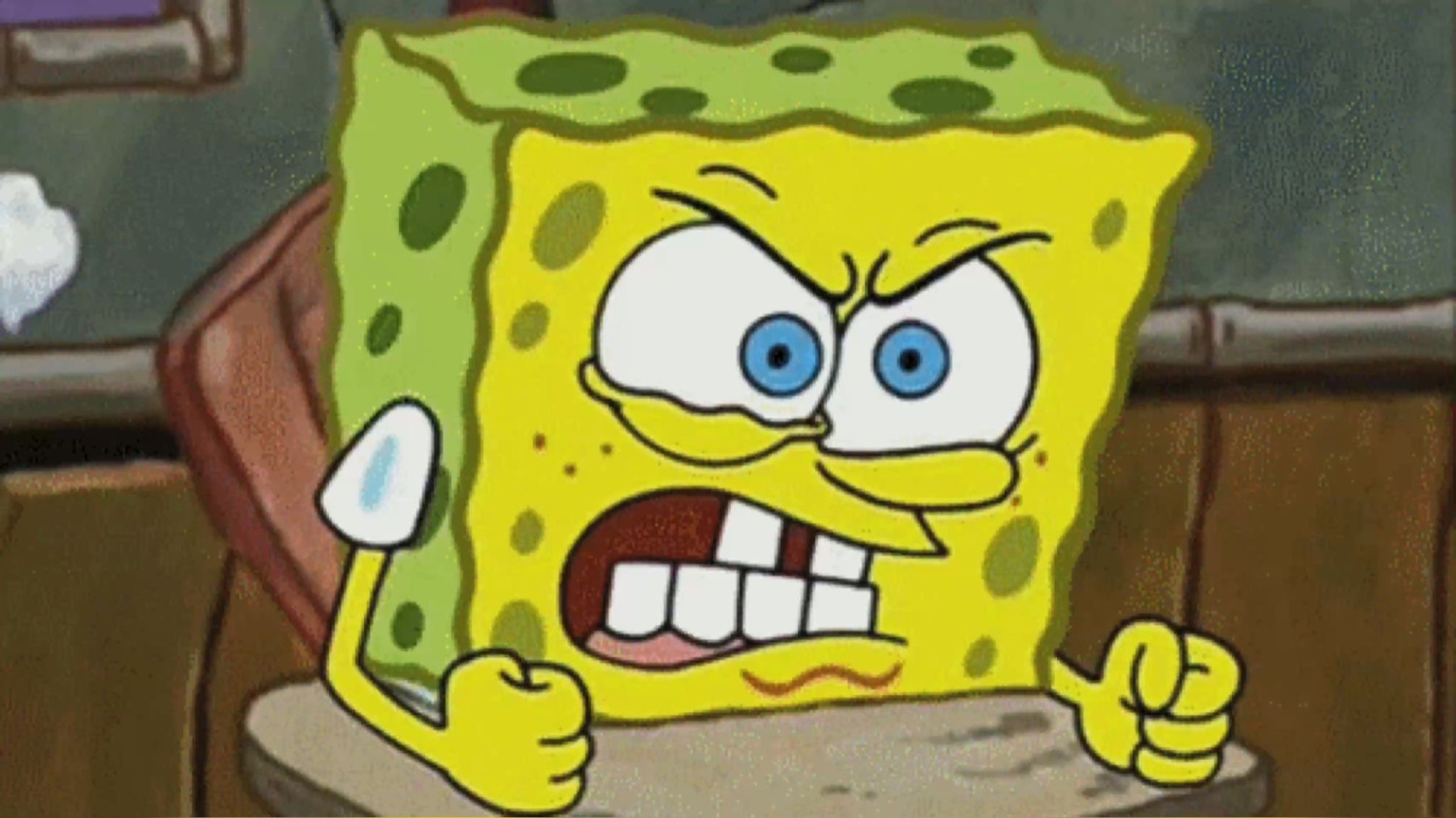 SpongeBob clenching his fists and screaming with furious squinted eyes