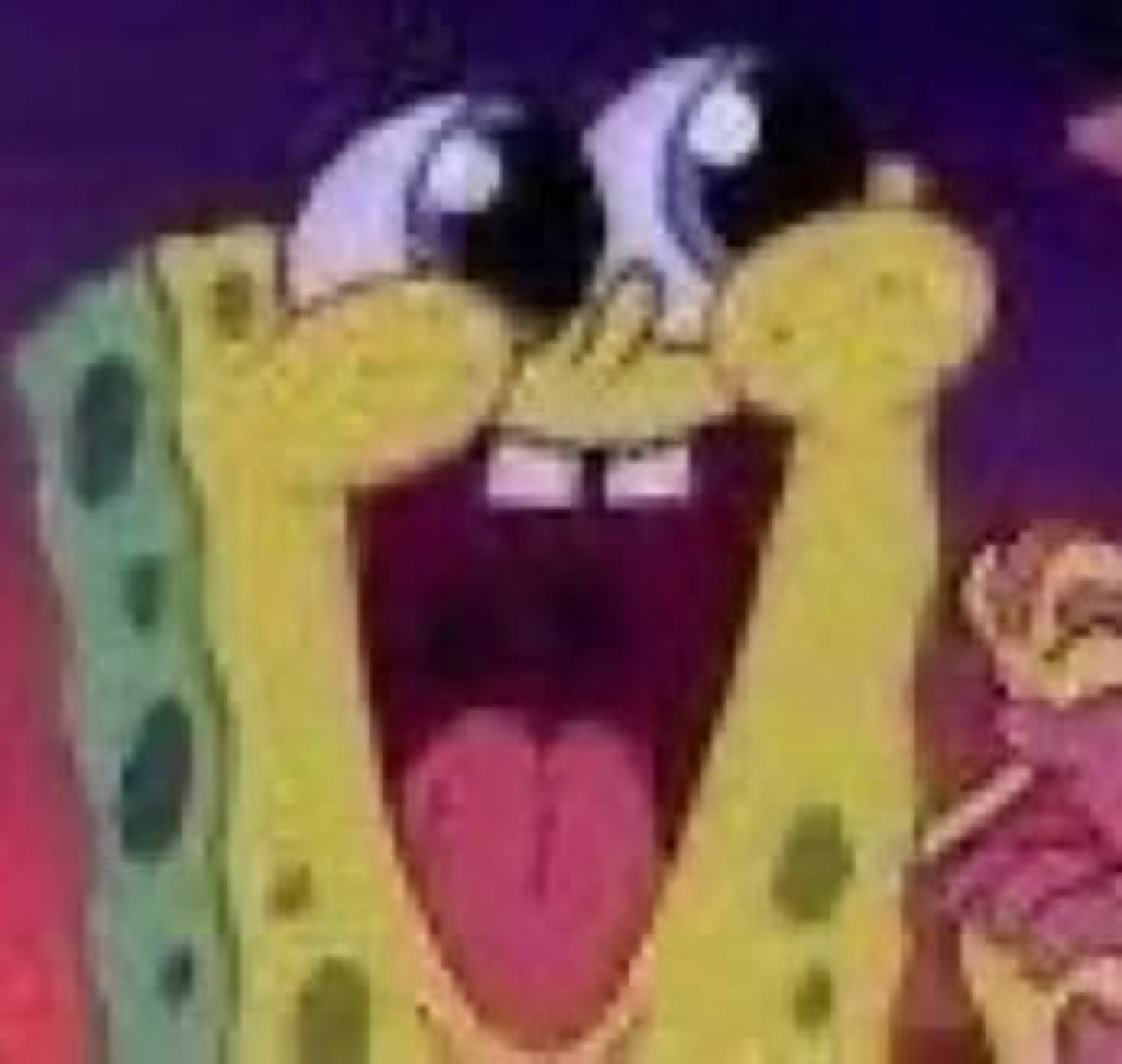 SpongeBob wide-eyed and screaming with tongue out in an extreme close-up