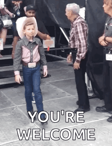 Little boy in a cowboy outfit strutting past a man, "You're welcome"