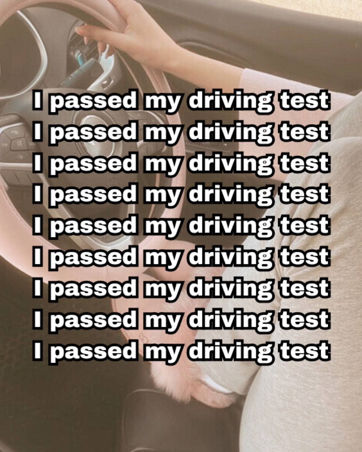 Hand on a wheel with 'I passed my driving test' repeated