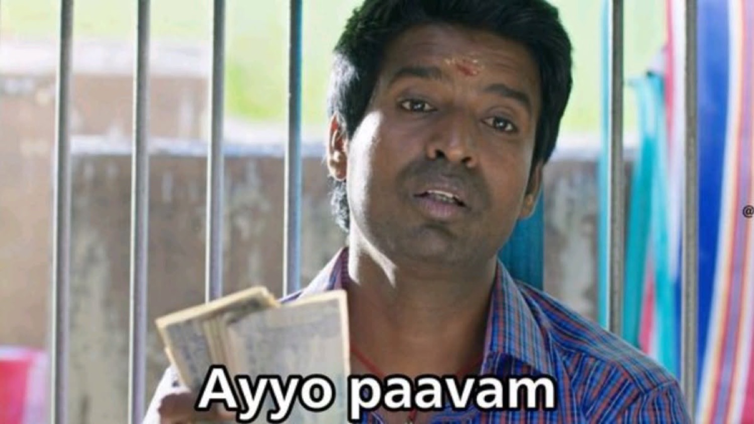 Man holding cash with a pitying look: 'Ayyo paavam' (oh, poor thing)