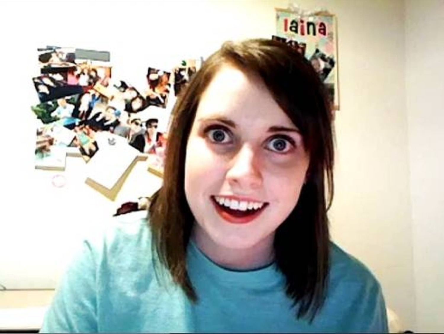 Overly Attached Girlfriend with wide unblinking eyes and an unnerving smile