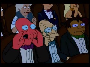Zoidberg gasping with his claws over his face at something scandalous in the audience