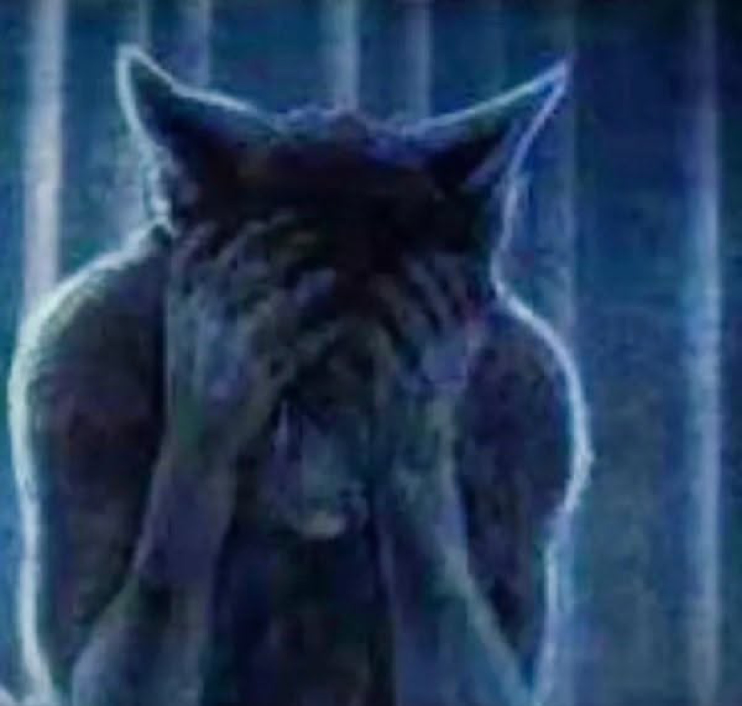 Shadowy wolf-like creature covering its face with both hands in despair