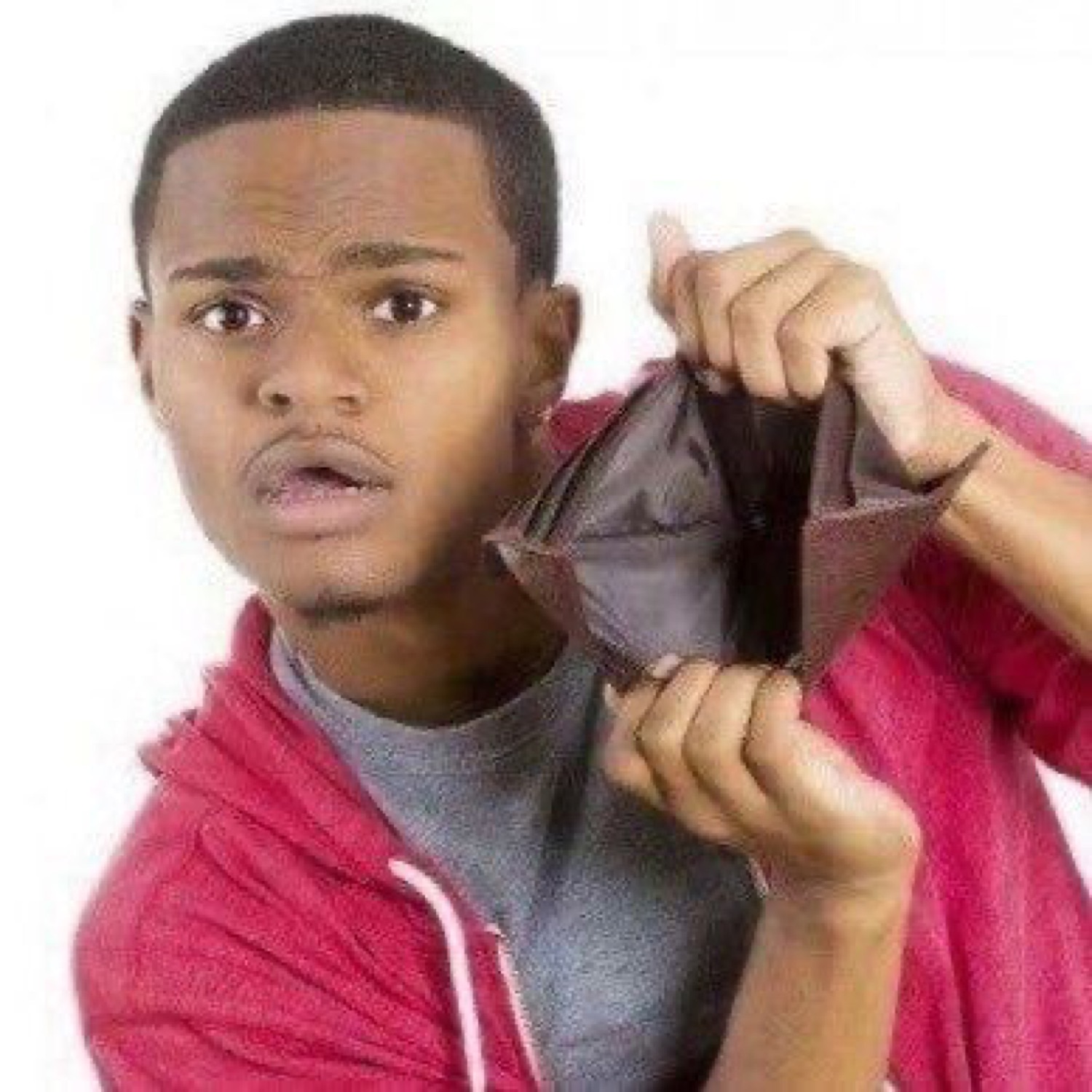 Guy in a red hoodie peering into a completely empty open wallet in disbelief