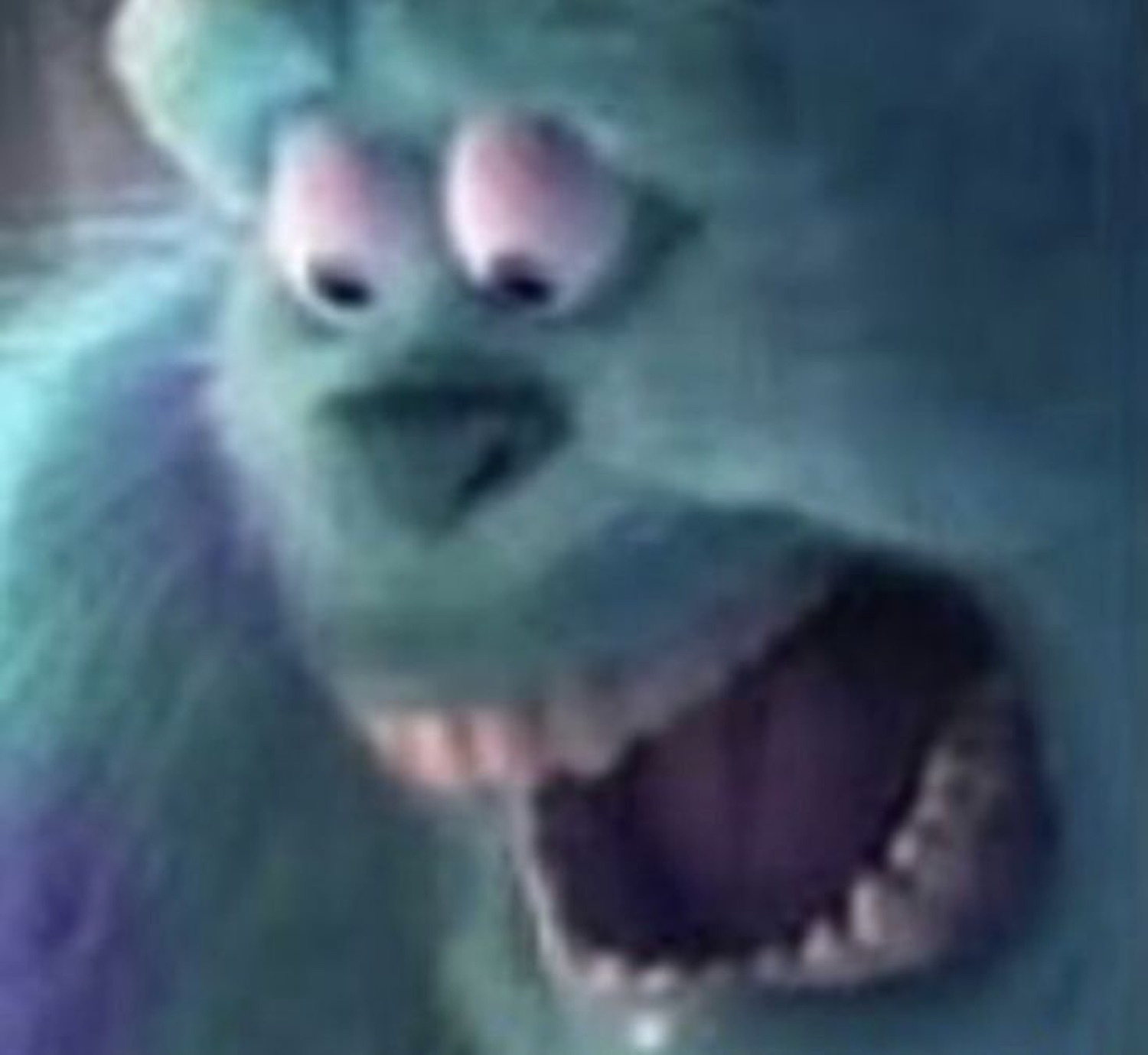 Blurry Sulley close-up, eyes bugged and mouth wide open in pure alarm
