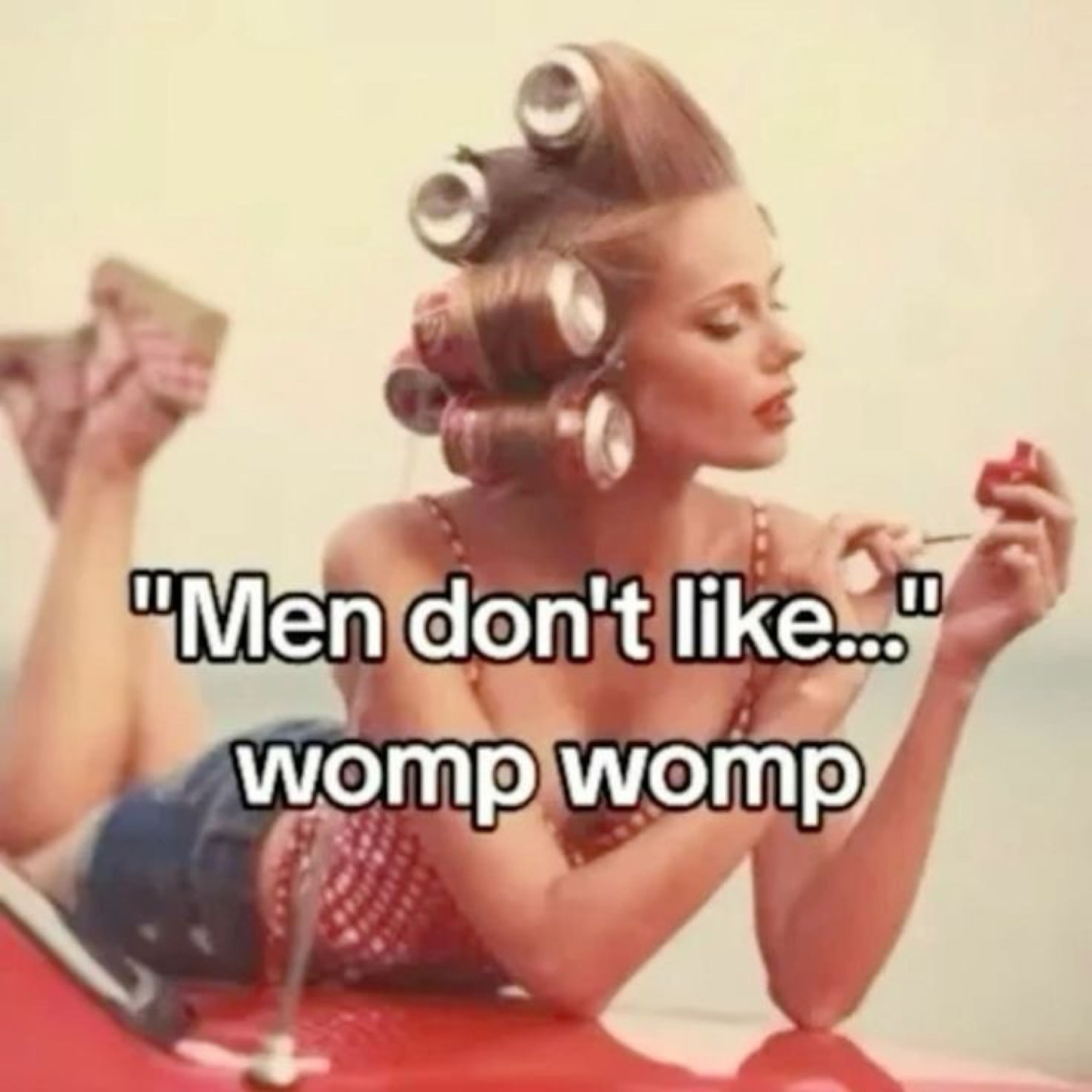 Retro woman in curlers painting her nails: '"Men don't like..." womp womp'