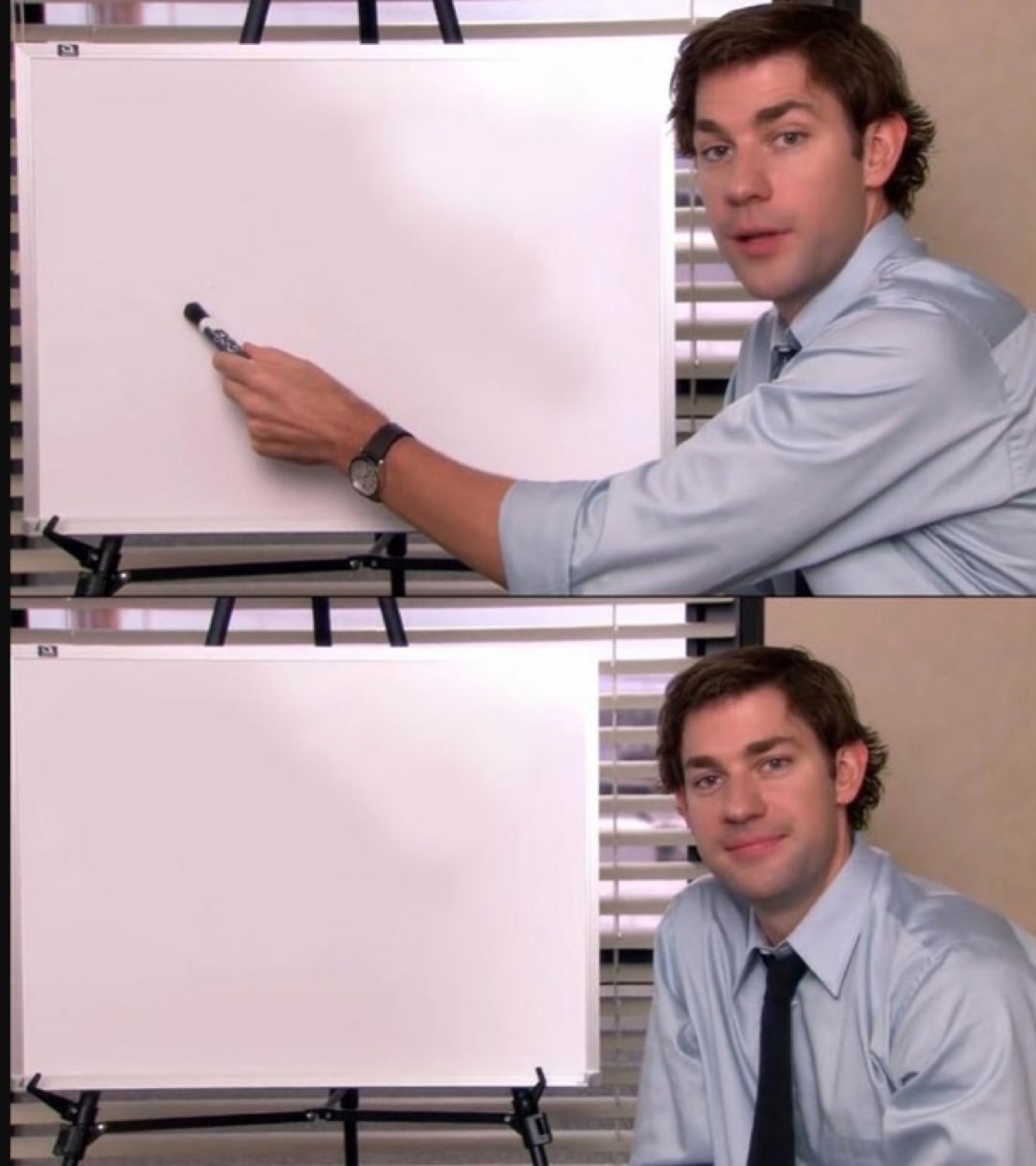 Man from The Office presenting a blank whiteboard then smirking at the camera