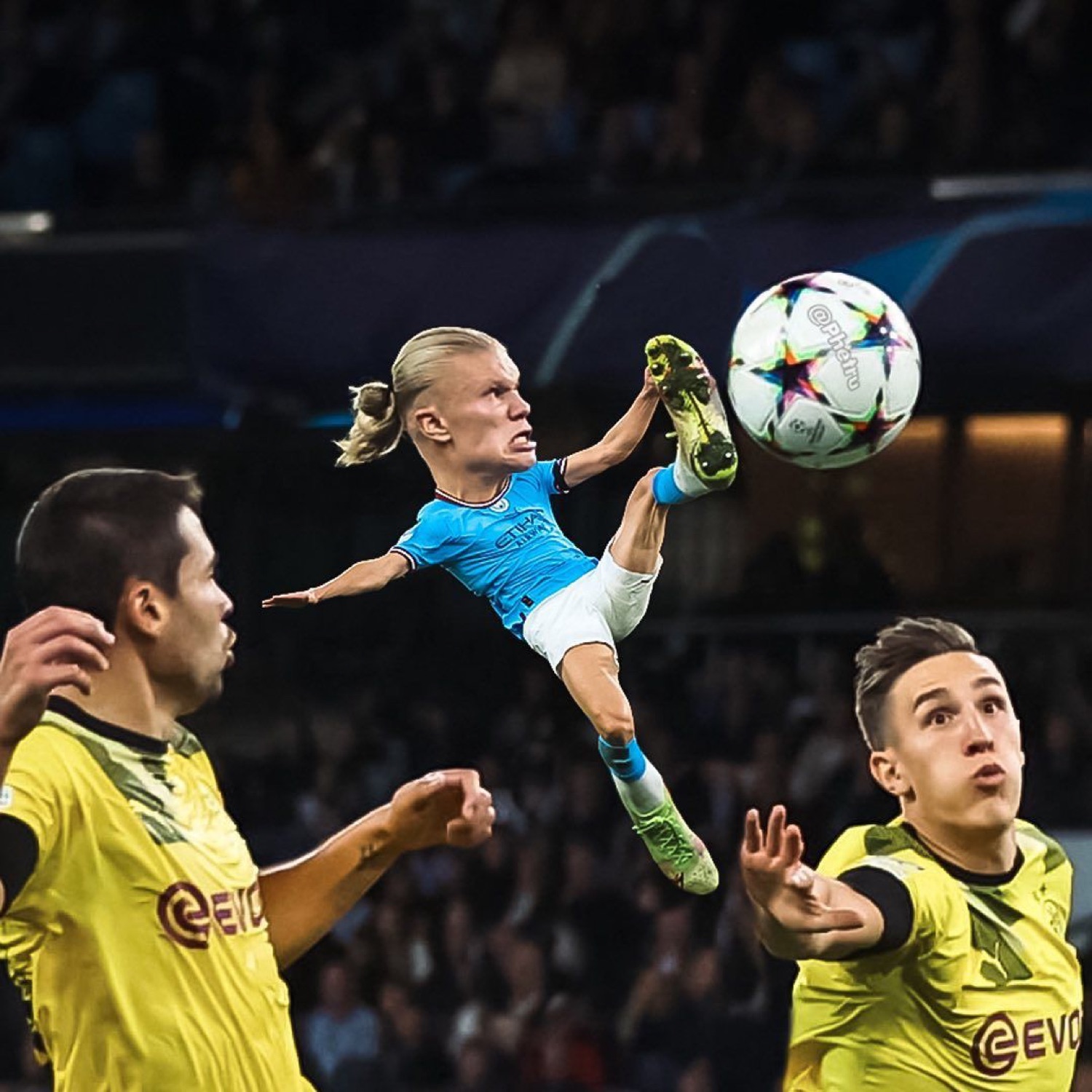 Erling Haaland mid-air in a scissor kick, volleying the ball between two Dortmund defenders