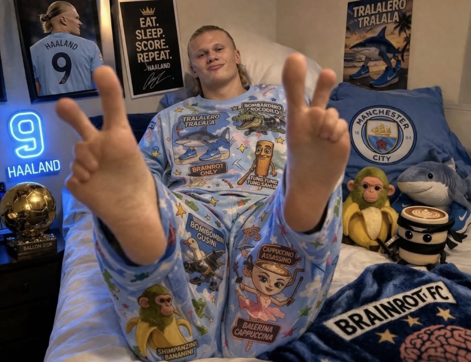 Blond guy in brainrot-print pajamas throwing up double peace signs on a Man City themed bed