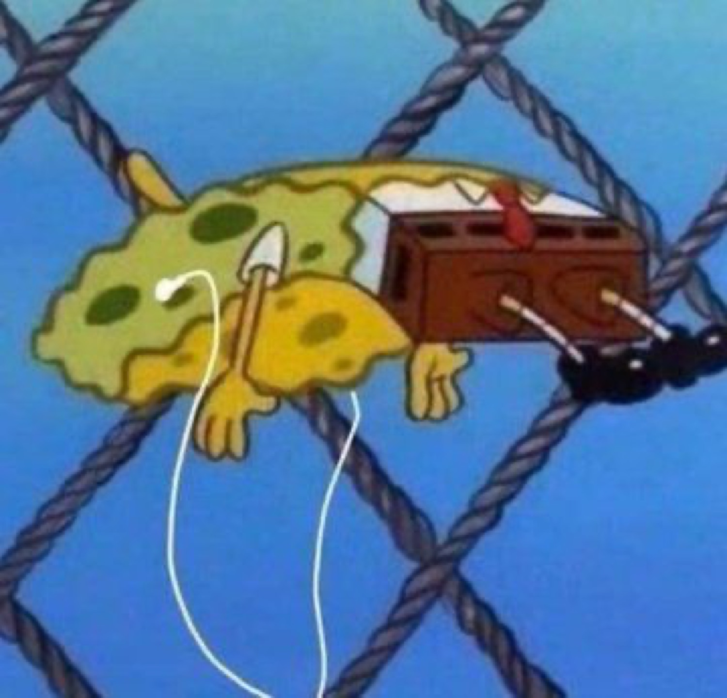 SpongeBob passed out face-down in a fishing net with headphones on