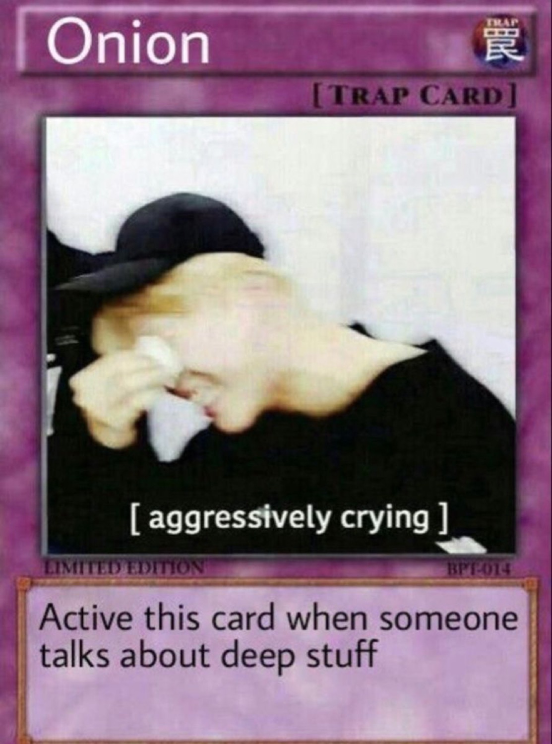 Yu-Gi-Oh 'Onion' trap card of a person aggressively crying into a tissue