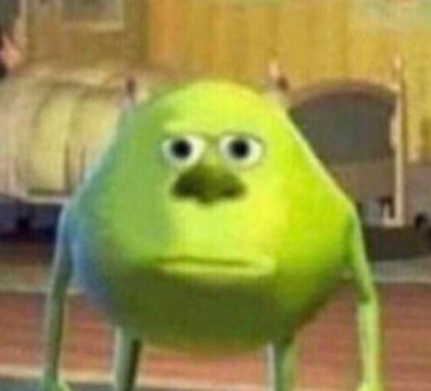 Mike Wazowski with Sulley's face swapped on, giving a flat deadpan stare