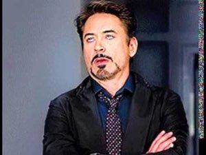 Robert Downey Jr. arms crossed, rolling his eyes in sarcastic disbelief