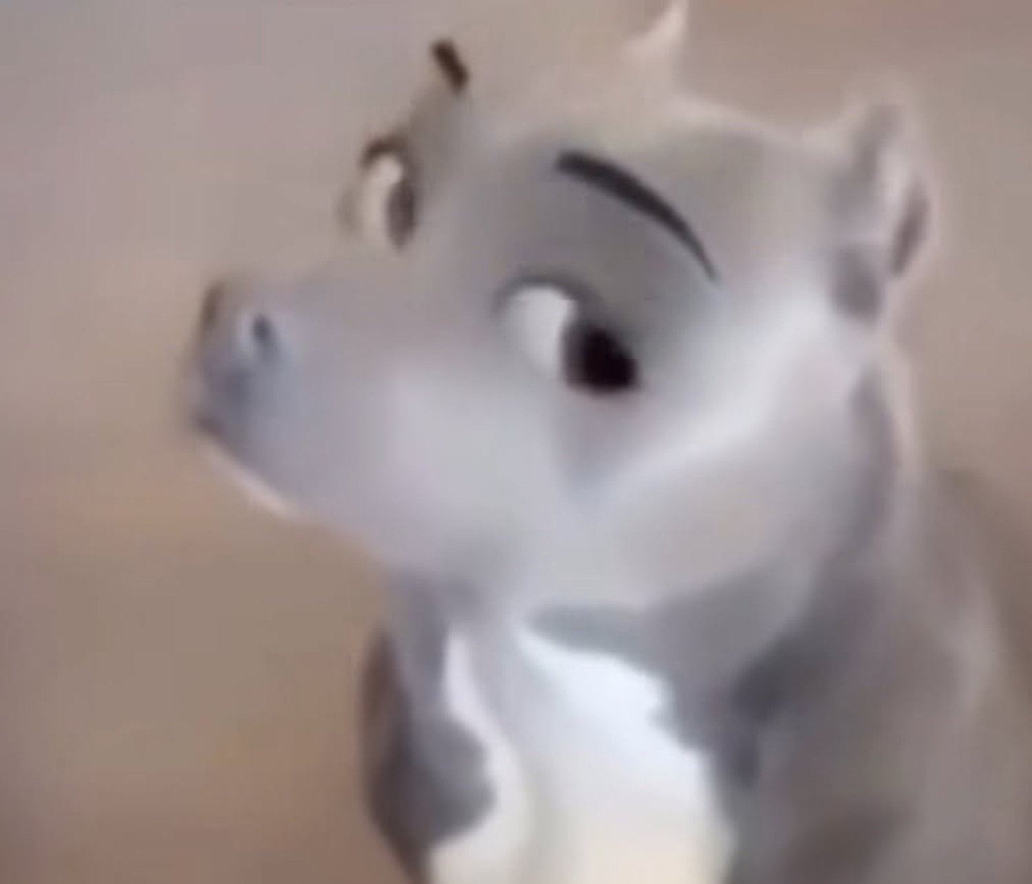 Grey cartoon hippo cocking its head with a wide, suspicious side-eye