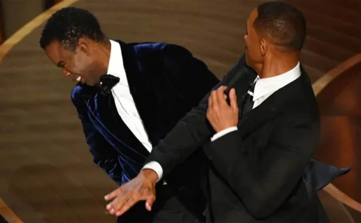 Will Smith slapping Chris Rock across the face on the Oscars stage
