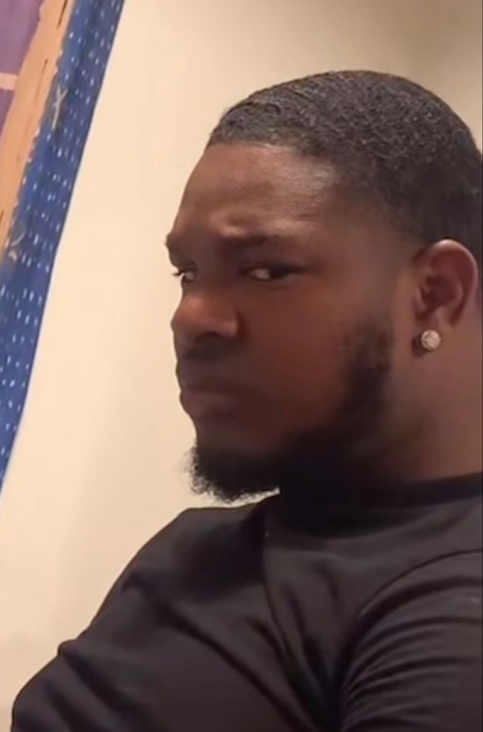 Man throwing a hard sideways glare with total skepticism