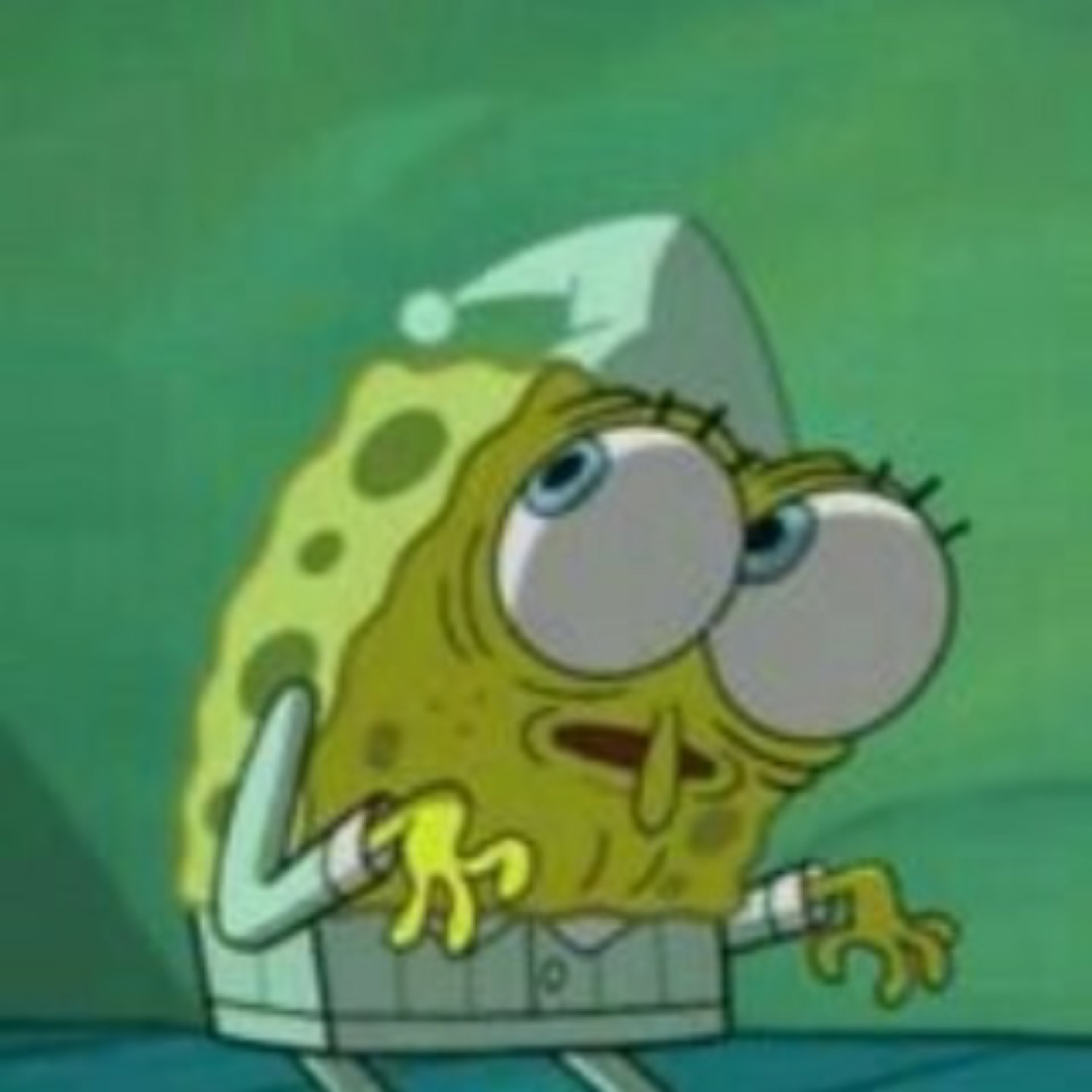 Lanky SpongeBob in a nightcap, eyes wide and mouth agape in confusion