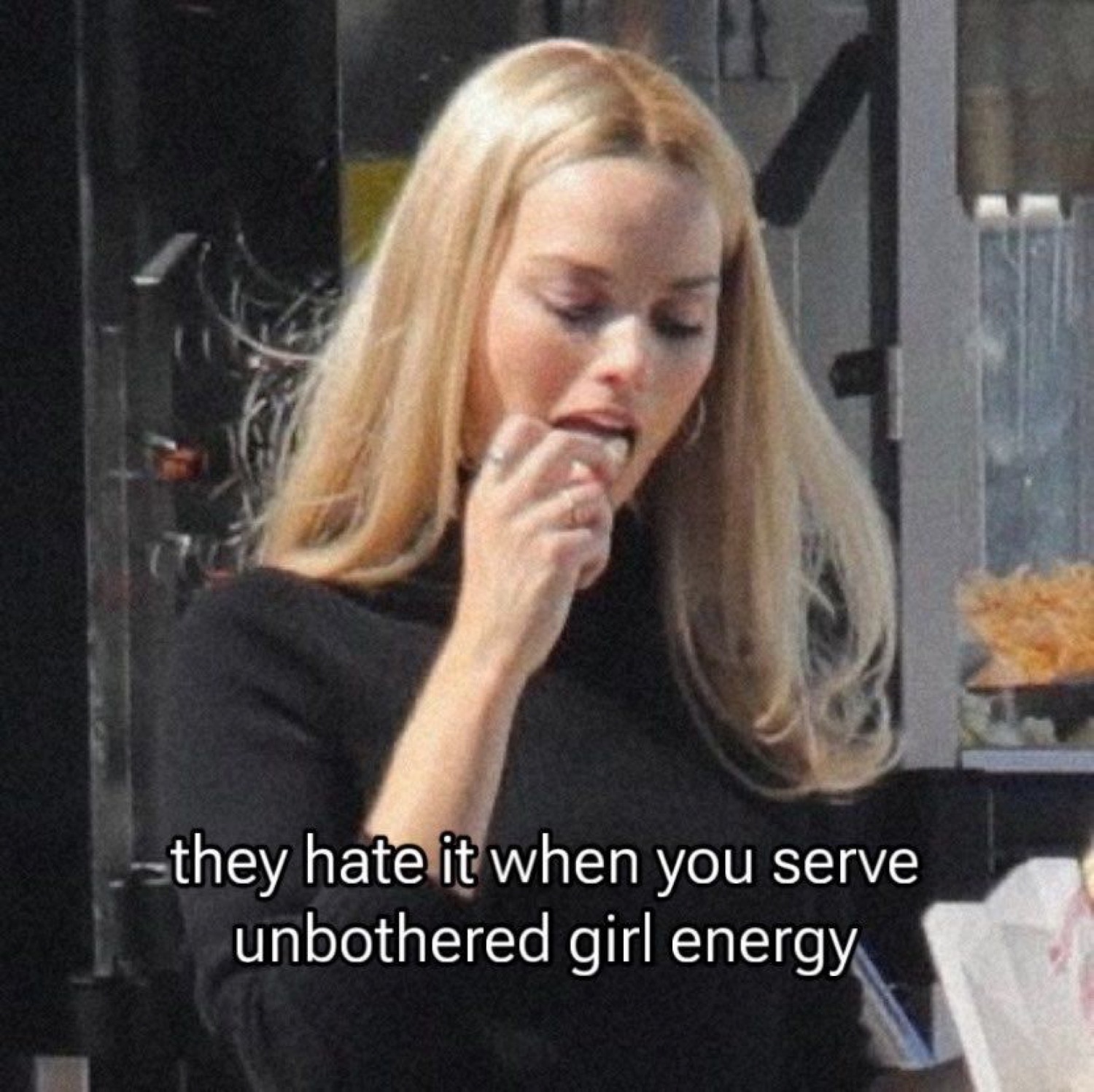 Margot Robbie licking her finger: 'they hate it when you serve unbothered girl energy'