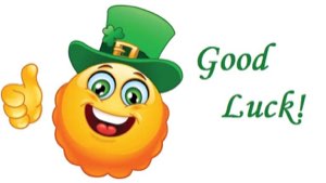 Smiley emoji in a leprechaun hat with a thumbs up: 'Good Luck!'