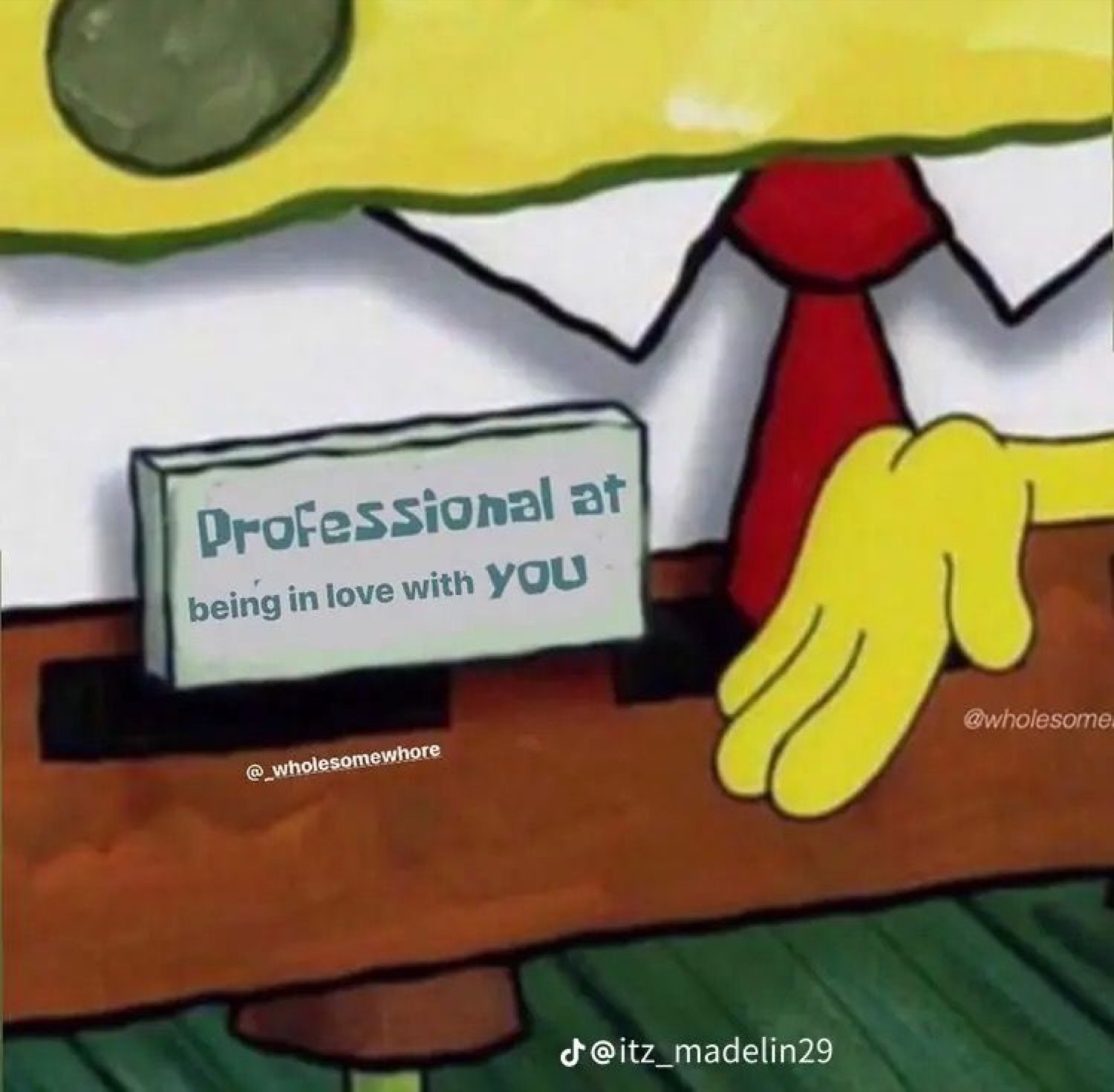 SpongeBob desk drawing with a nameplate reading 'Professional at being in love with you'