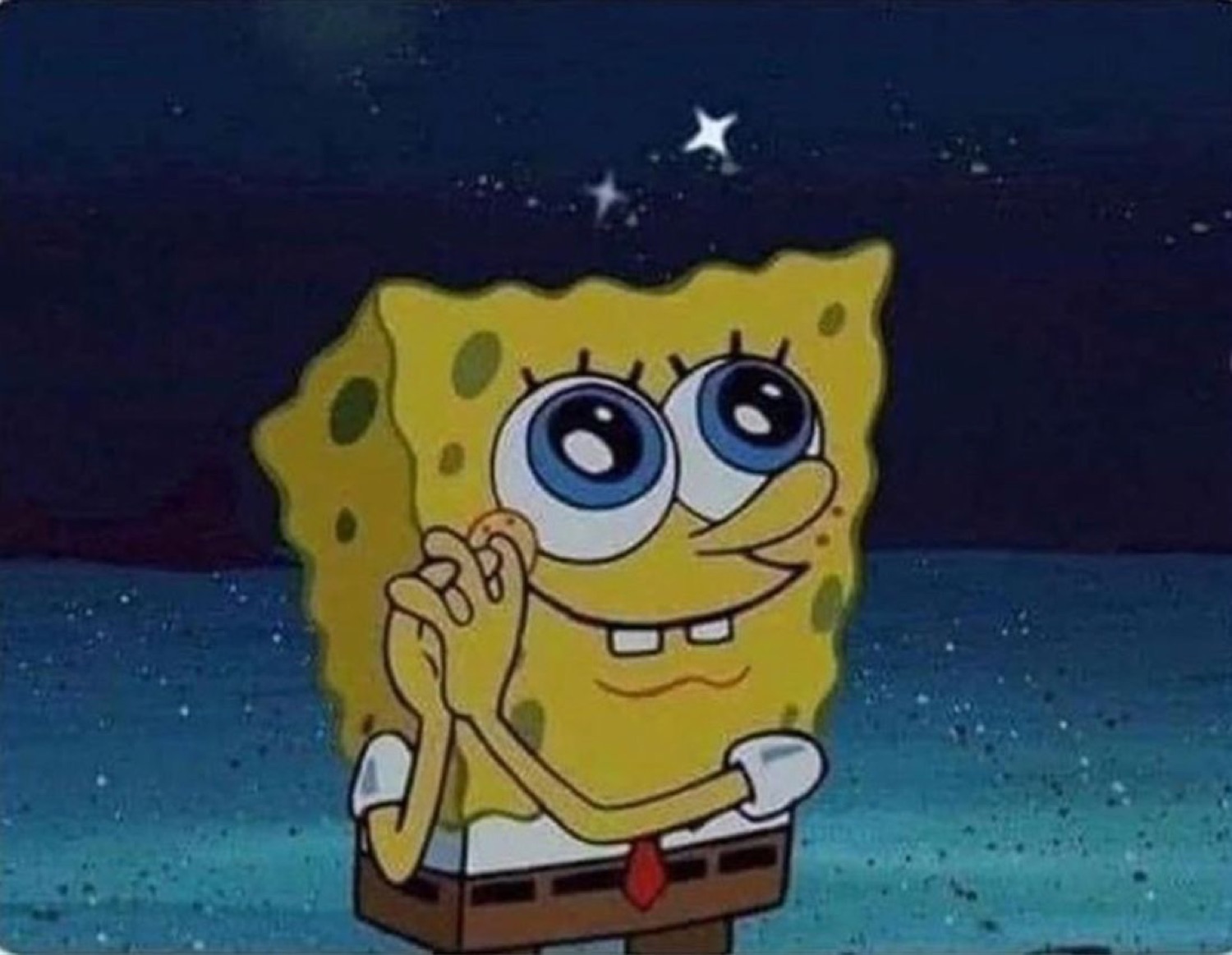 SpongeBob clasping his hands with sparkly starry eyes and a dreamy smile