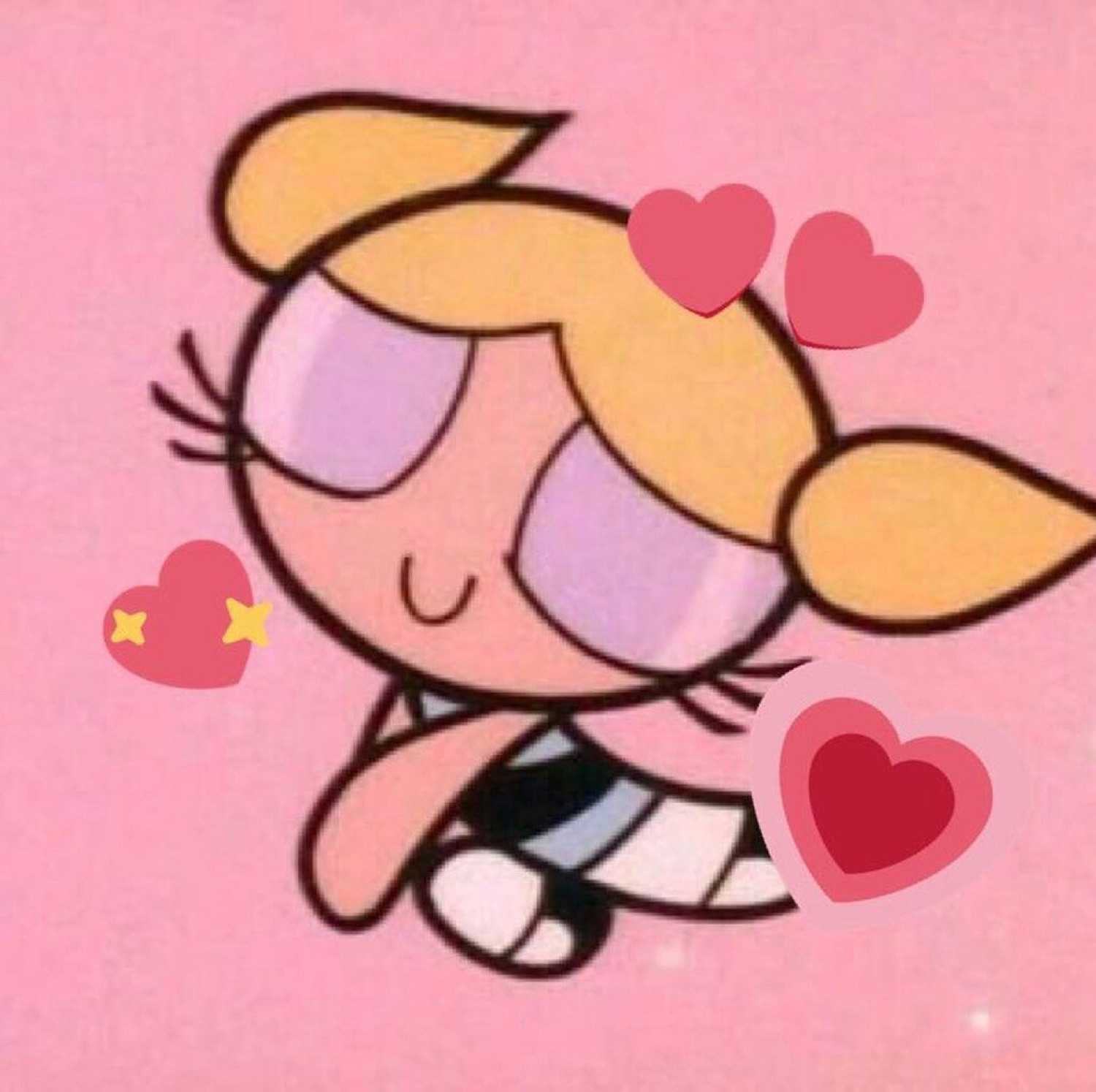 Bubbles from the Powerpuff Girls blushing sweetly surrounded by pink hearts