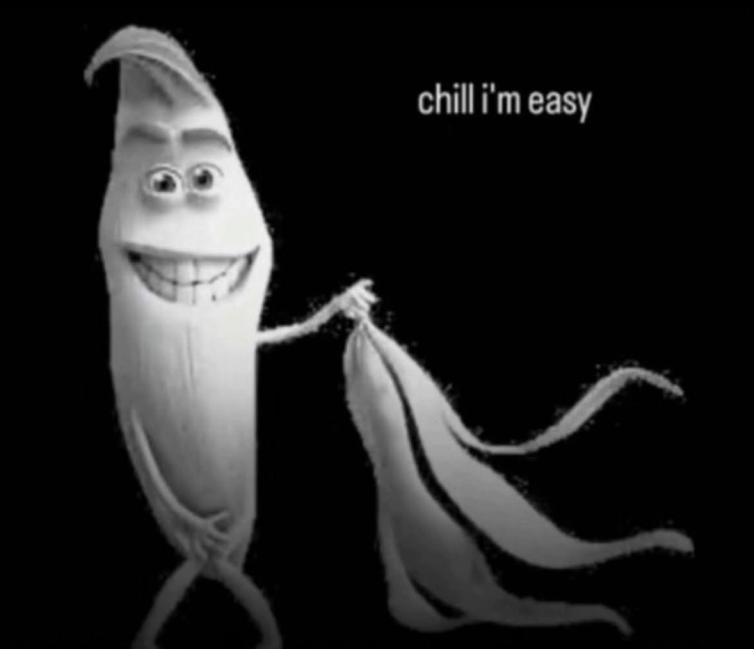 Grinning cartoon banana peeling itself, captioned 'chill i'm easy'