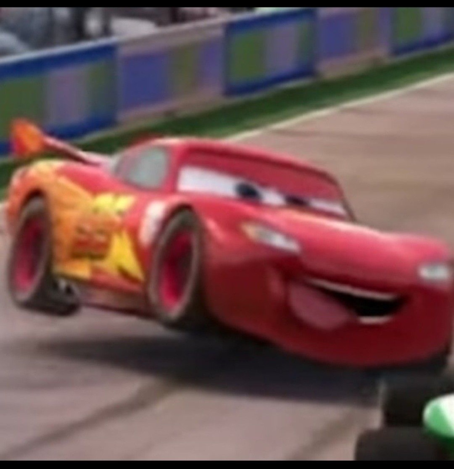 McQueen smirking and swerving on the track