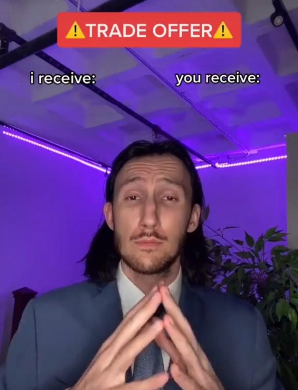 Suited guy with steepled fingers presenting an empty trade offer meme