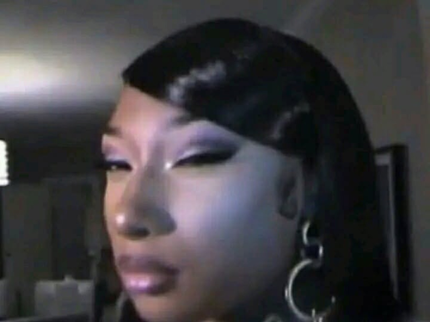 Megan Thee Stallion giving an unbothered side look