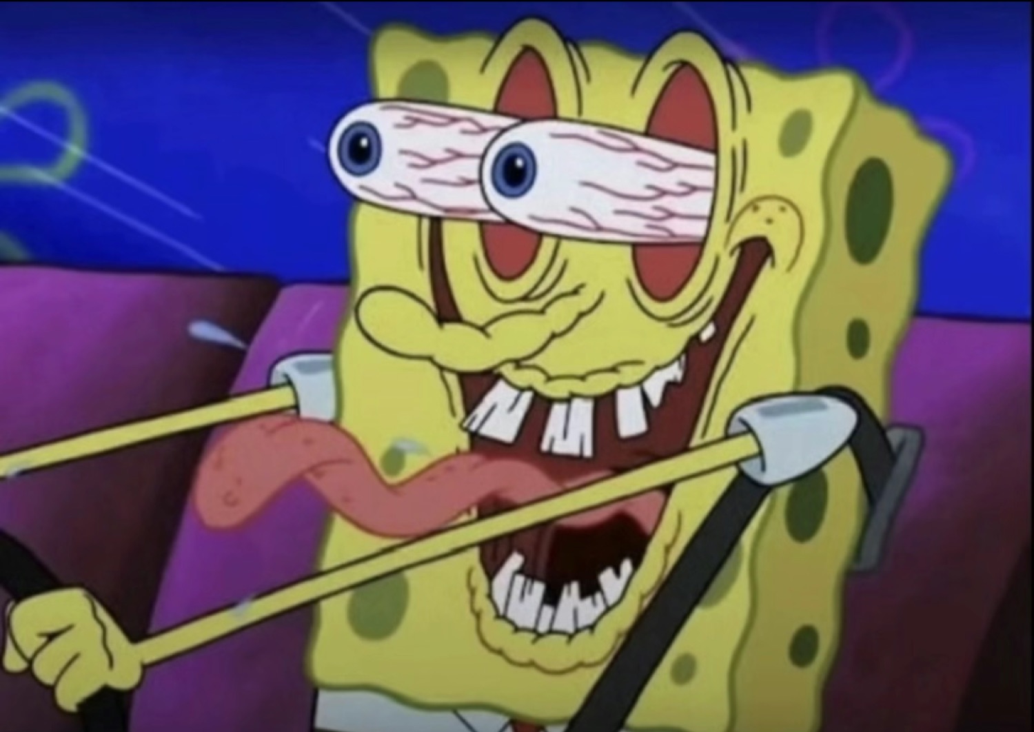 SpongeBob with bulging bloodshot eyes and a manic grin, gripping a steering wheel