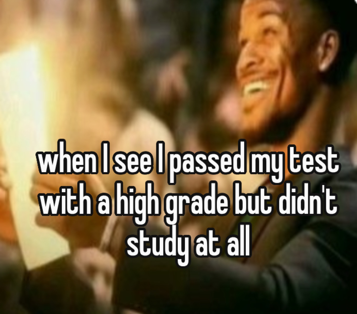 Man laughing in candlelight: 'when I see I passed my test with a high grade but didn't study at all'