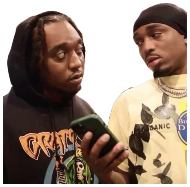Two rappers hunched over one phone, both throwing serious side-eye at the screen sticker