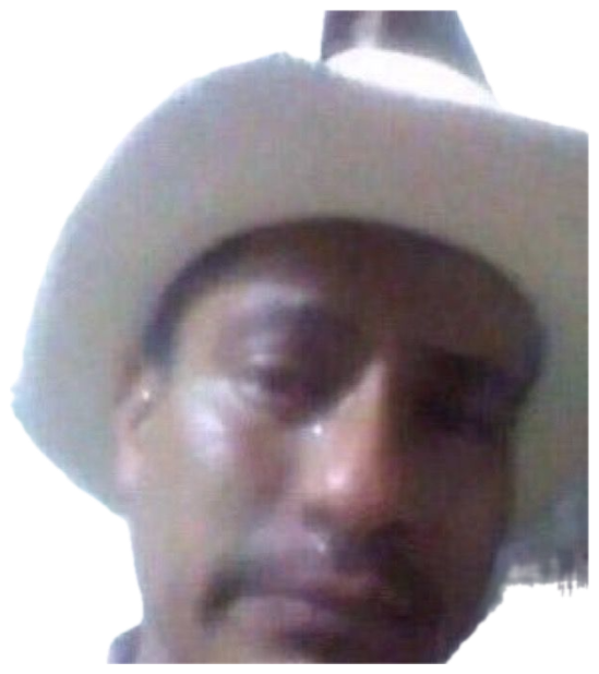 Man in a white cowboy hat with tears streaming down a completely deadpan face sticker