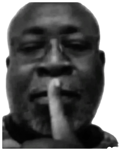 Grainy black-and-white close-up of a man holding a finger to his lips, thinking quietly sticker