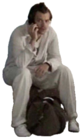 Man sitting on luggage on the phone, captioned 'mom, can u pick me up? i'm scared' sticker