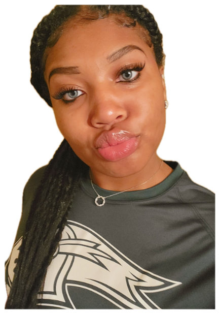Selfie of a young woman in an Eagles shirt making a playful pout at the camera sticker