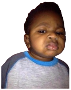 Toddler under a ceiling fan giving a deeply skeptical, unimpressed pout sticker