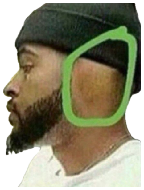 Bearded man in a beanie staring blankly out a car window with a single tear circled in green sticker