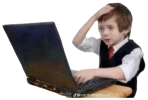 Young boy in suit and tie at a laptop, hand on head, staring in shock at the screen sticker